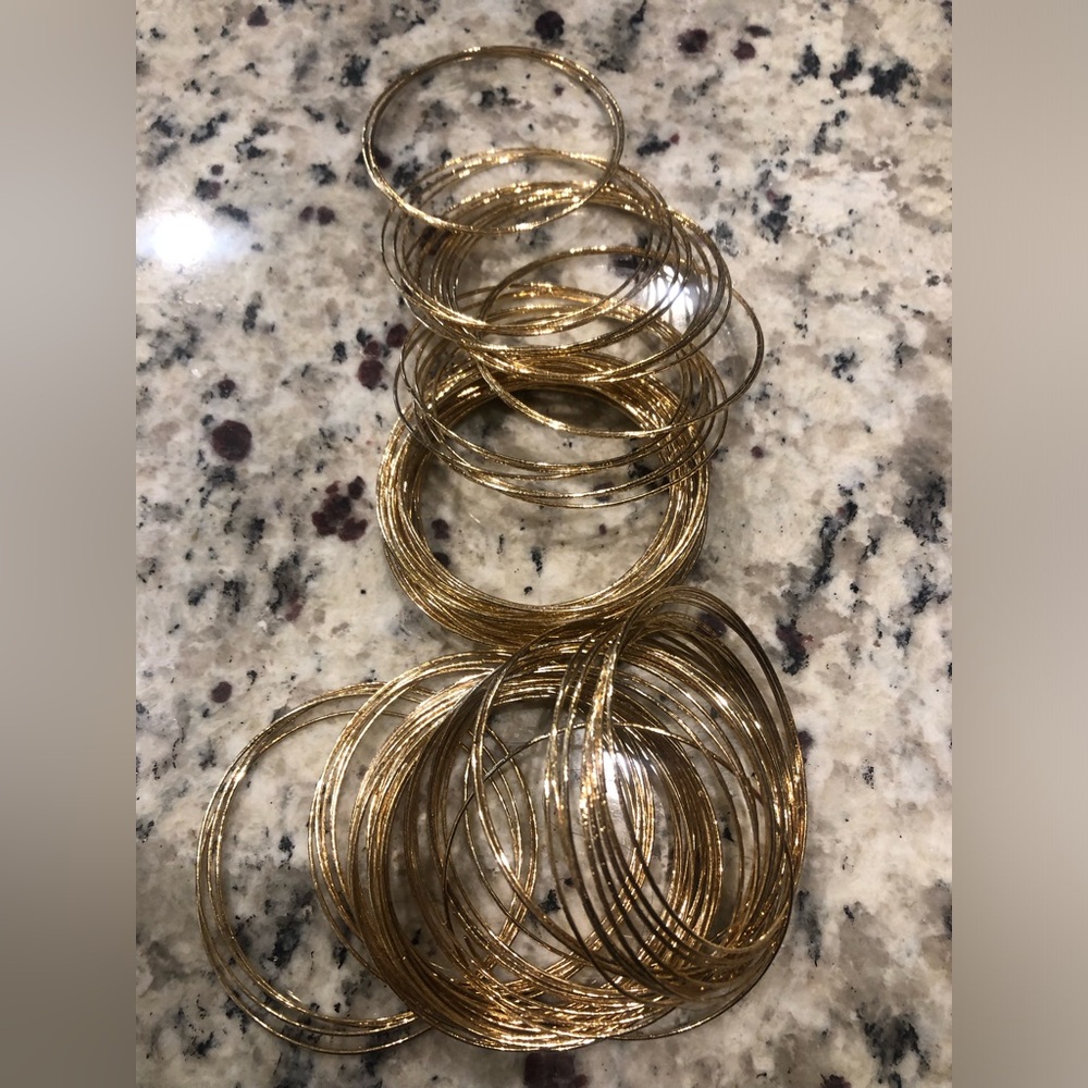 Gold Colored Thin Stackable Bangle Bracelet Set F… - image 1